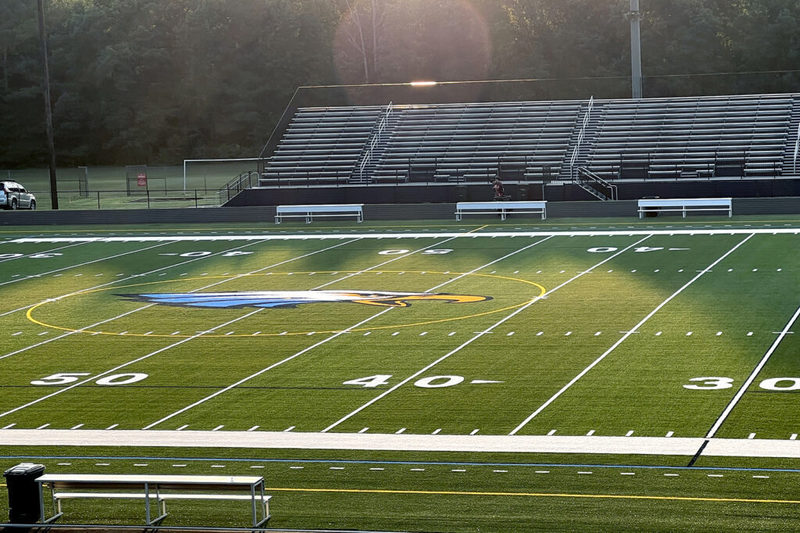 Aerial view of football field at dawn