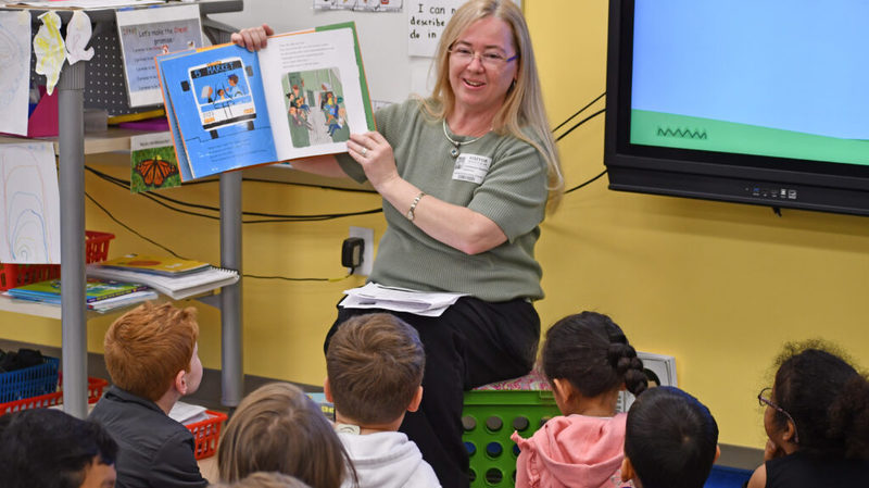 Teacher reading to students