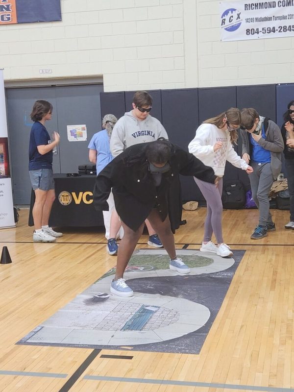 Students playing a game in the gym