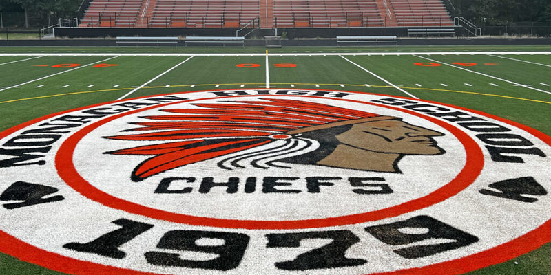 Monacan High School logo on football field